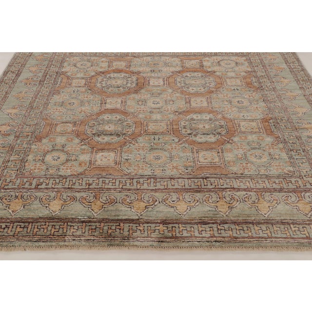 Hand-knotted in exceptional natural silk, this rare 8x8 square carpet is a masterful contribution to Rug & Kilim’s Modern...