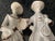 Set of 2 ceramic figurines Embossed signature "A" A pair of ceramic figurines of a man and a woman. The man has an...