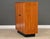 A mid century modern teak armoire dresser with lots of drawer space and a black plinth base. Made in Canada. Circa 1970’s....