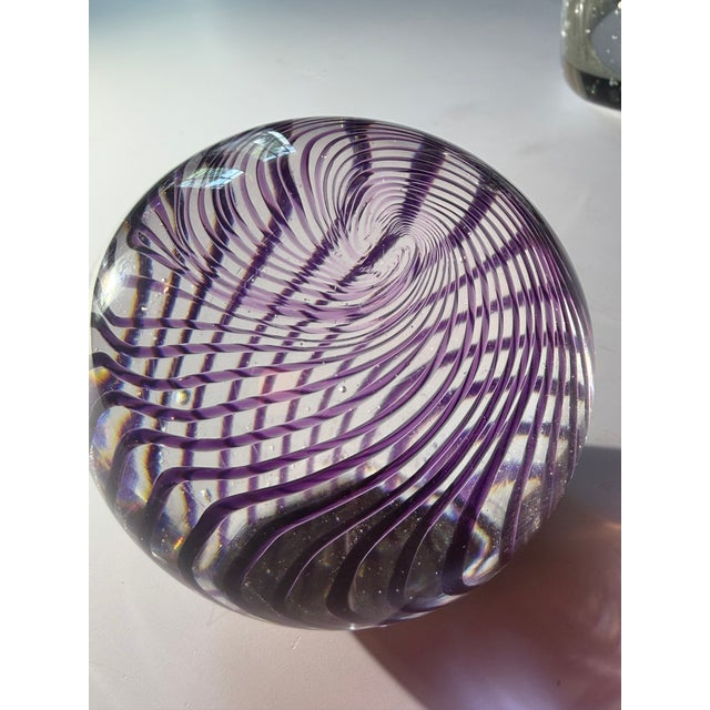 "Elevate your desk or curated shelf with this beautiful vintage hand-blown art glass paperweight. The piece features an...