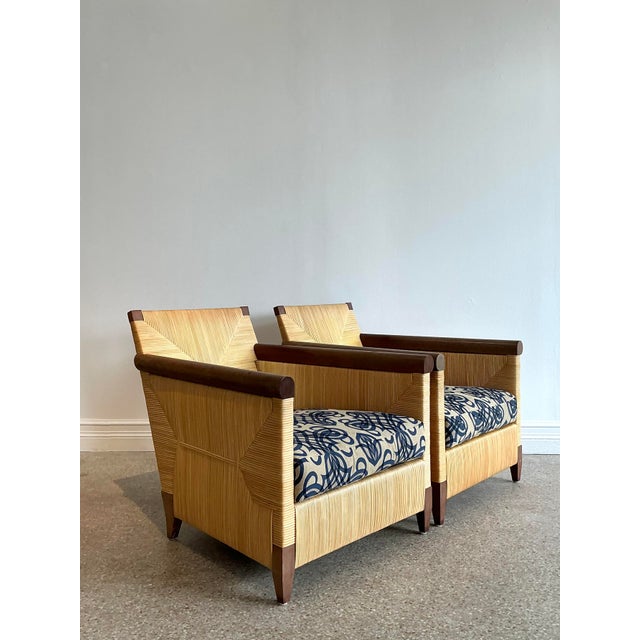 Elevate your interior with this exceptional pair of "Merbau" lounge chairs, designed by the legendary John Hutton for the...