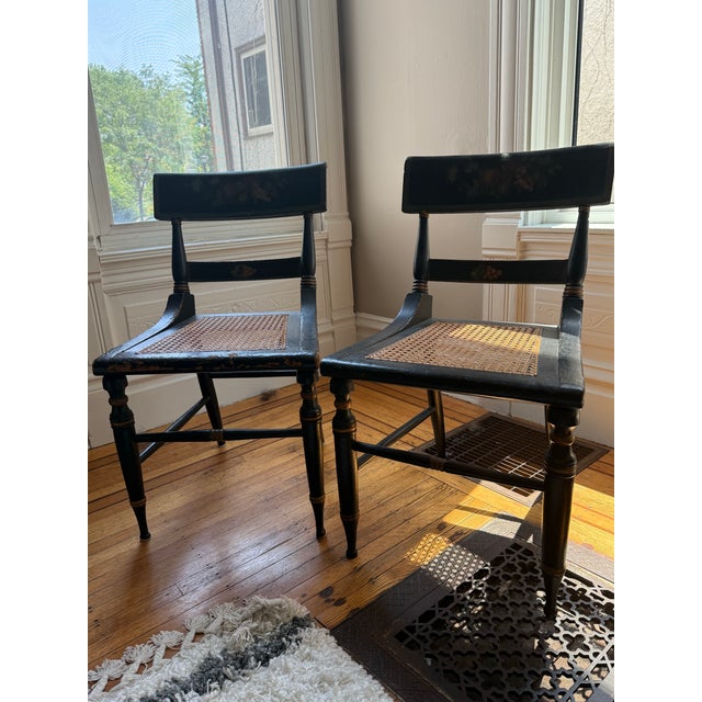 Beautiful matching pair of antique Victorian chairs dating to the late 1800s. They have their original black ebonized...