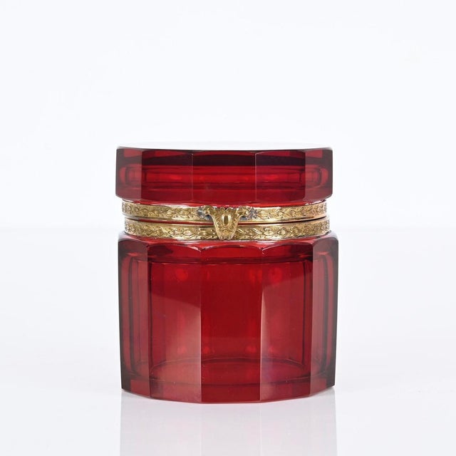 Stunning jewelry box in faceted ruby red Murano glass and gilt silver. This incredibly rare piece was produced in Italy in...