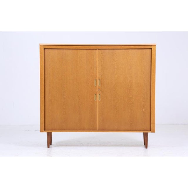 Beautiful vintage filing cabinet from the 60s FEATURES * Manufacturer: Werner Stehroll * Timeless vintage design * 1 key *...