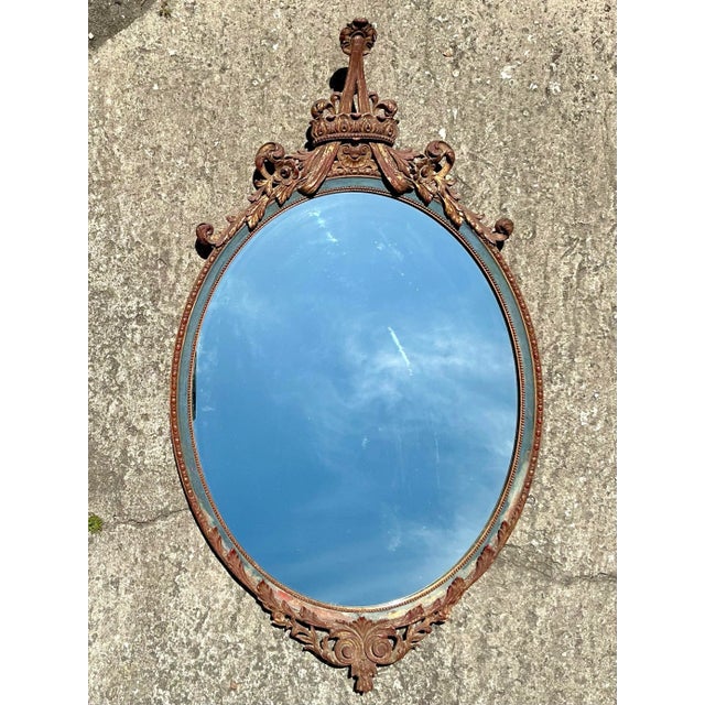 Enhance your decor with this Vintage Regency mirror, adorned with elegant gilt-tipped swags. This American-style piece...