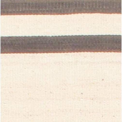 Vintage striped handwoven Turkish Kilim, circa 1950, features bold, linear patterns that embody a timeless design. Its...