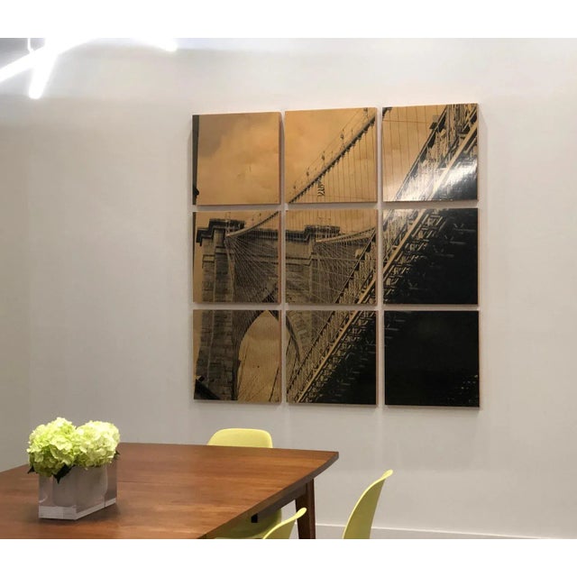 This is a beautiful contemporary photograph of the iconic brooklyn bridge. The photograph is processed in a way that the...