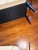 Hollywood Regency Hollywood Regency Style Cream Leather Bench With Black Saber Legs & Nailhead Trim For Sale - Image 3 of 5