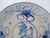 Chinese Swatow ware shallow bowl or saucer. White porcelain with blue crab motif at rim and Chinese character center....