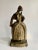 A wonderful sculptural figure of a lady - use as a heavy duty bookend, decor or door stop. Intricate in detail wearing...