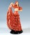 Finest viennese art ceramic from the 1930s: standing dancer in a long ruffled skirt with red lace decoration, which she...