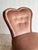 This vintage slipper chair features a softly scalloped back with subtle button tufting and a low armless profile that...