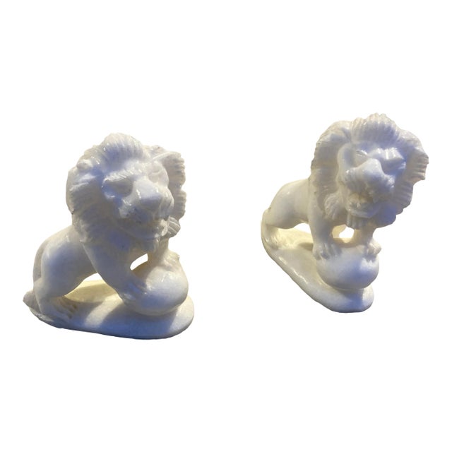 Vintage pair of detail hand carved soapstone lion sculptures or small statues, made Vietnam, circa 1980s.