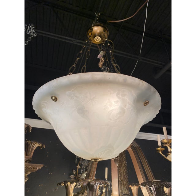 A large 1920's Opaline glass lights fixture with dancing cherubs design, interior lights