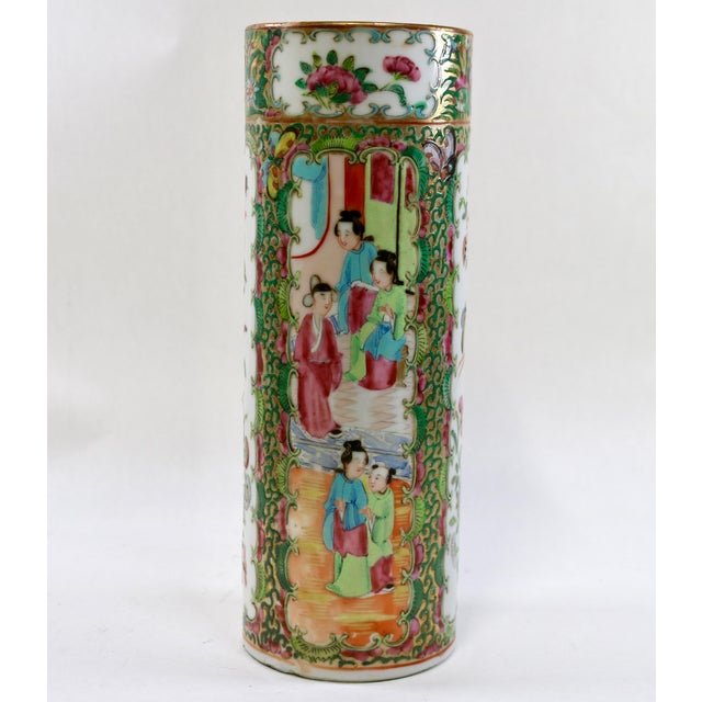 Gorgeous 19th century cylinder vase in the popular rose medallion pattern. The artwork is impressive down to the tiny eyes...