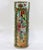 Gorgeous 19th century cylinder vase in the popular rose medallion pattern. The artwork is impressive down to the tiny eyes...