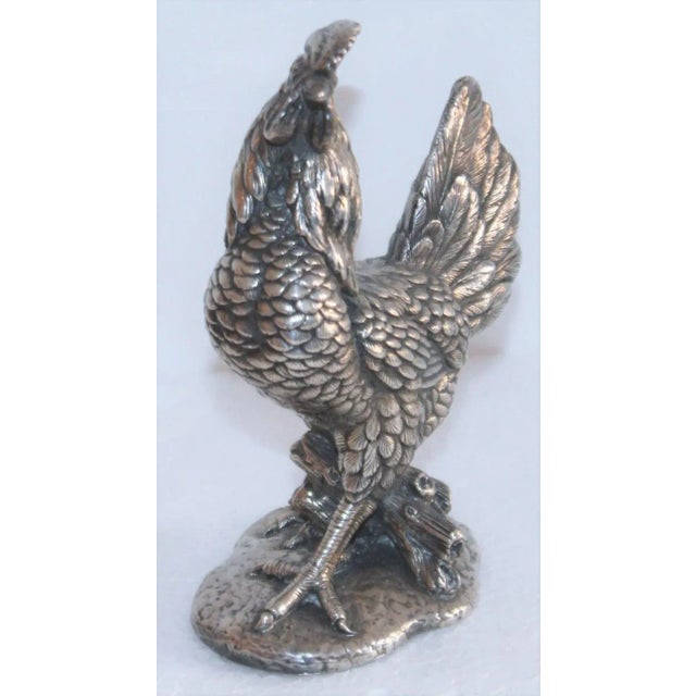 This sterling silver heavy hollow body rooster figure is signed 925 on the base and is in fine condition. Beautifully made...