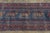Hand-knotted in wool, this 3x5 vintage Anatolian runner rug from Turkey is a charming example of tribal weaving,...