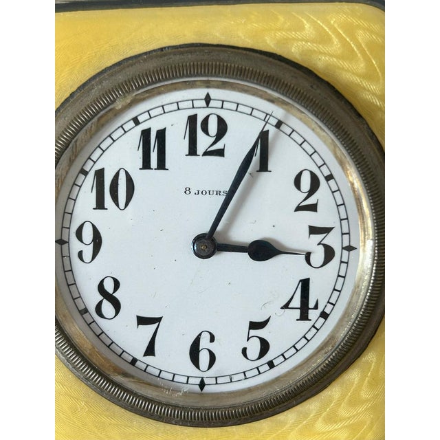 Huitaine - Art Deco Enamel Table Clock, 1920s-1930s Metal case with yellow guilloché enamel and black bezels, white enamel...