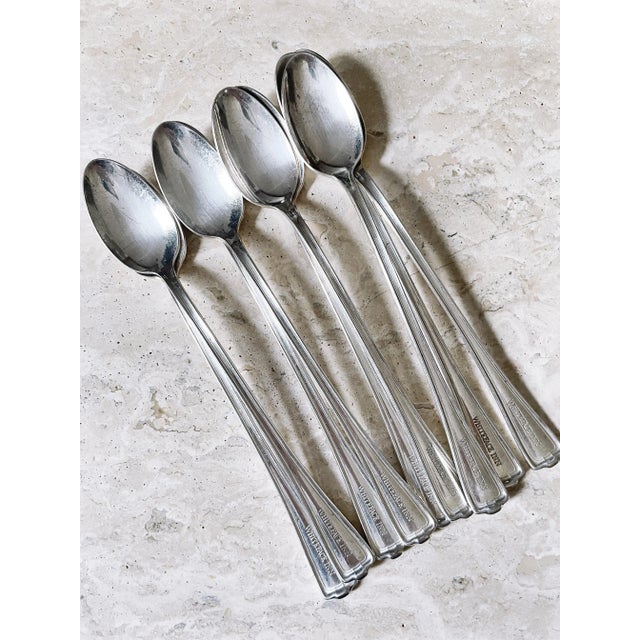 A set of nine lovely antique circa early 1900s silver plated iced tea spoons from the historic Whiteface Inn on Lake...