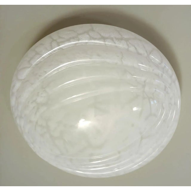 Vintage Italian flush mount or wall light with a single milky white ribbed Murano glass shade / Made in Italy, circa 1960s...