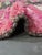 Pink Sunset Totem Moroccan Wool Rug This striking Moroccan wool rug features a vibrant pink backdrop paired with a bold,...