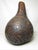 Vintage large scale African carved calabash gourd, c.1970’s Having a bulbous body and tapering neck, this gourd is a folk...