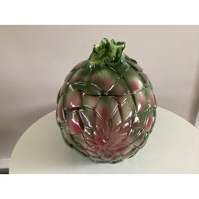 Elevate your dining table with this large ceramic covered casserole or soup tureen, which is shaped like a large...