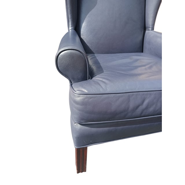 Elevate your living space with this exquisite Ethan Allen Genuine leather Wingback armchair, a perfect blend of classic...