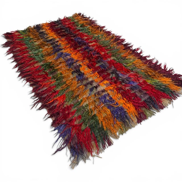 This antique Filikli Tulu rug from Konya, approximately 100 years old, showcases the signature long pile of this weaving...
