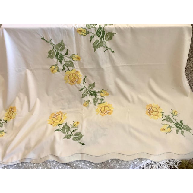 Vintage hand embroidered cross stitch needlework tablecloths 57” x 87” yellow flowers green leafs 100% cotton Weight after...