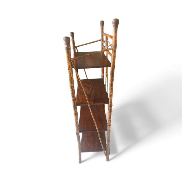 Antique tiger bamboo & wood etagere in excellent condition for its age. Came out of an estate . Great size 48.5 “ tall.