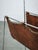 Elegant Italian Modernist magazine and newspaper rack dating from the 1980s, crafted from cognac brown leather and a...