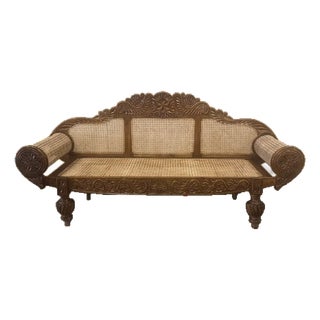 British Colonial Cane Settee With Hand-Carved Teak Wood Details For Sale