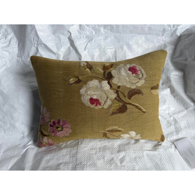 This museum-quality French Aubusson tapestry pillow preserves a genuine fragment from the renowned weaving workshops of...
