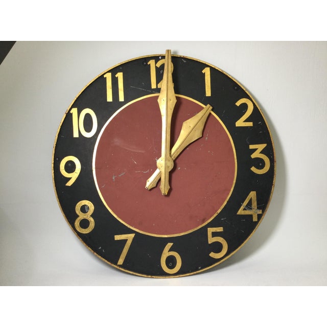 A large 72 inch diameter acretectual clock face in painted and gilt steel. The clock is for decorative purposes and is not...