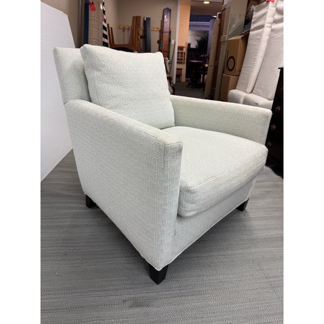 Design Plus Gallery presents a Custom Chair + Ottoman by HMS for Sunrise Home. Simple lines and tone-on-tone subtle...