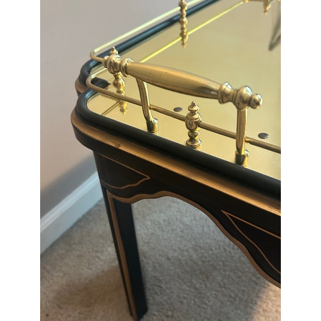 An exceptional and highly sought-after mid-century Hollywood Regency tea serving table produced by Drexel Heritage as part...