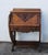 This Secretary Desk is made out of wood, solid wood, oak, tiger oak, and veneer. This Secretary Desk has Gothic style...