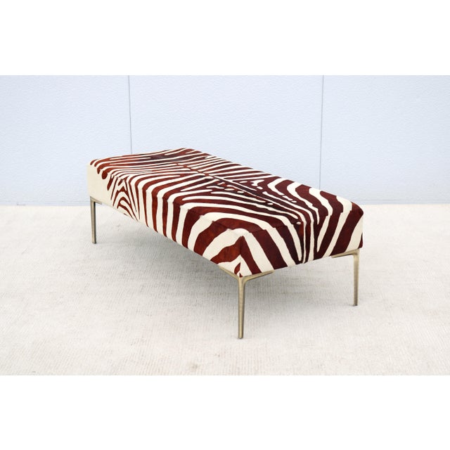 Stunning mid-century modern authentic zebra hides ottoman, bench, or coffee table with brushed bronze legs. This...