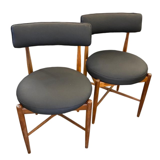 Nordic chairs designed by Ib Kofod Larsen for the British firm G-Plan in the 1960s. Crafted from teak, their distinctive...