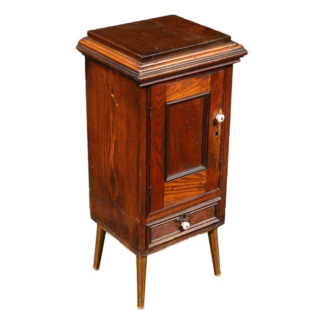 Late 19th Century Early American Oak Cabinet With Tapered Brass-Capped Legs For Sale