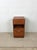 This mid century modern nightstand by Heywood Wakefield features hardwood construction, unique drop front cabinet with...