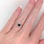 Stunning is an understatement for this ring! The all natural diamond halo and accents perfectly emphasize the vivid blue...