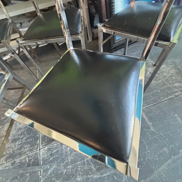 Set of six modern chairs from the 1970s in chromed and gold-plated metal, attributed to Romeo Regs. In good overall...