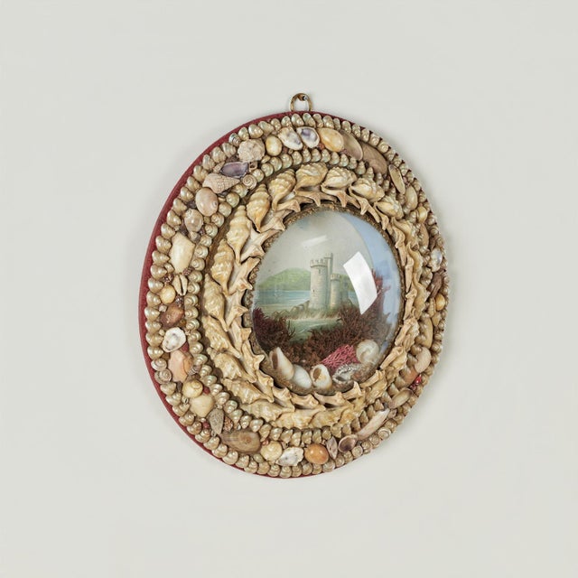 Charming late 19th century sailor’s valentine intricately handcrafted from an assortment of exotic seashells, centered by...