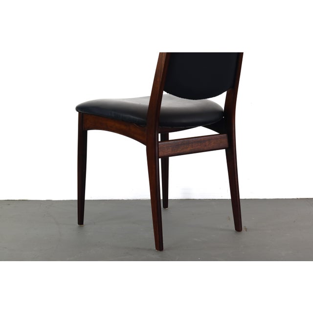 Tall, comfortable, and sturdy desk / side chair in original black vinyl and solid wood fram made of Afromasia (Danish...