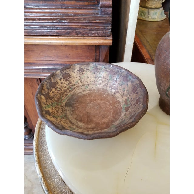 Beautiful rustic condition antique French and possibly American vessels. The pitchedhas dark green glaze and is 10" h by...