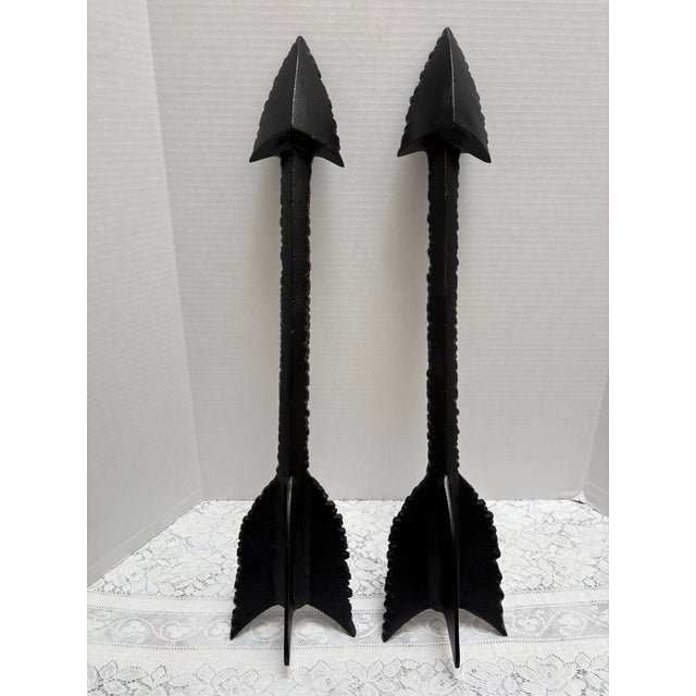 Large rugged edged set of two black metal arrow wall accents. Hardware on the back for easy hanging. Set of two with...