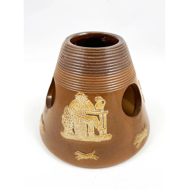 A lovely antique Royal Doulton Harvest ceramic stoneware match striker, featuring the classic raised design of rustic men...